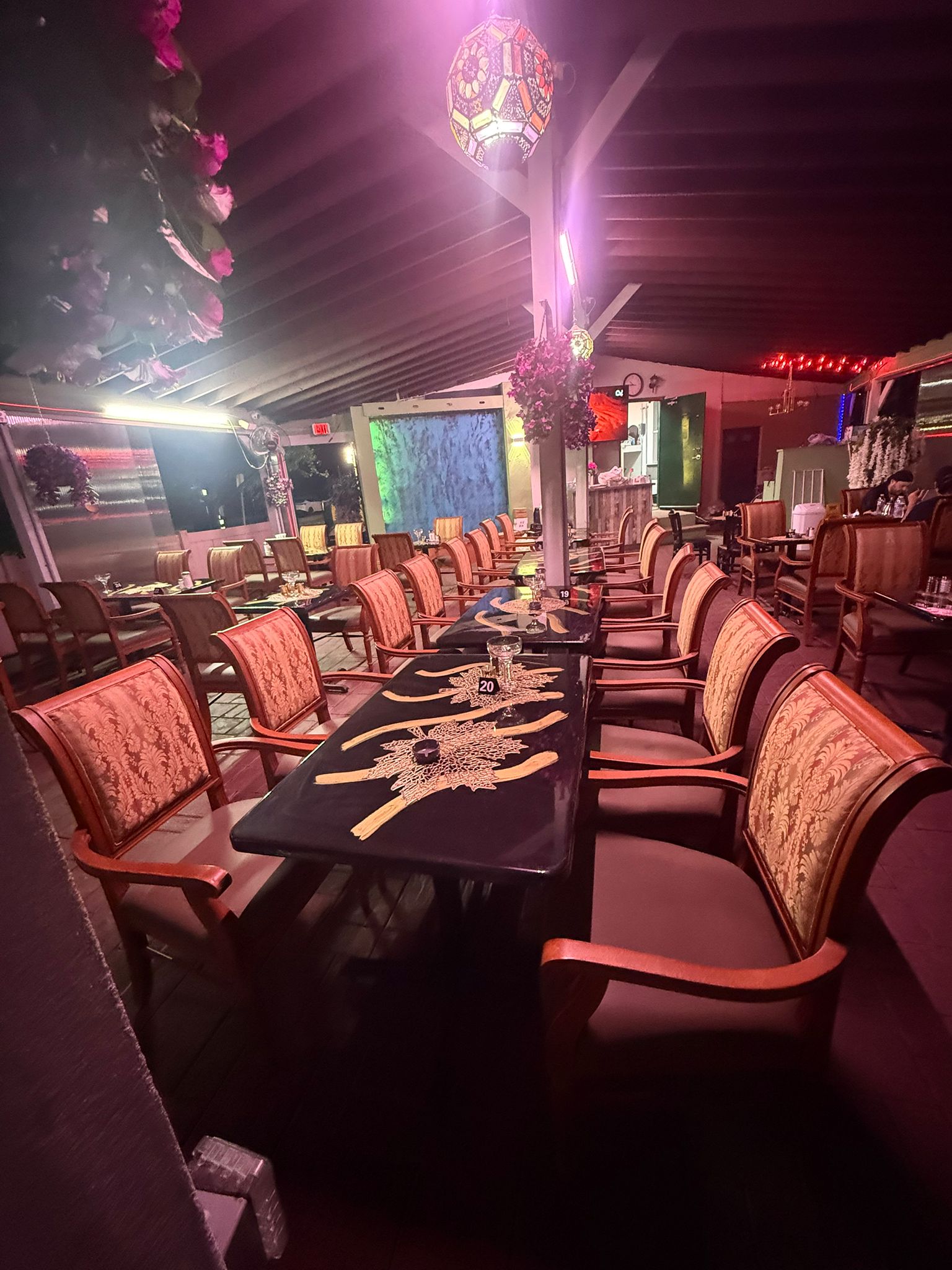 Outdoor patio dining at Arabic restaurant in Clifton NJ with halal food and hookah